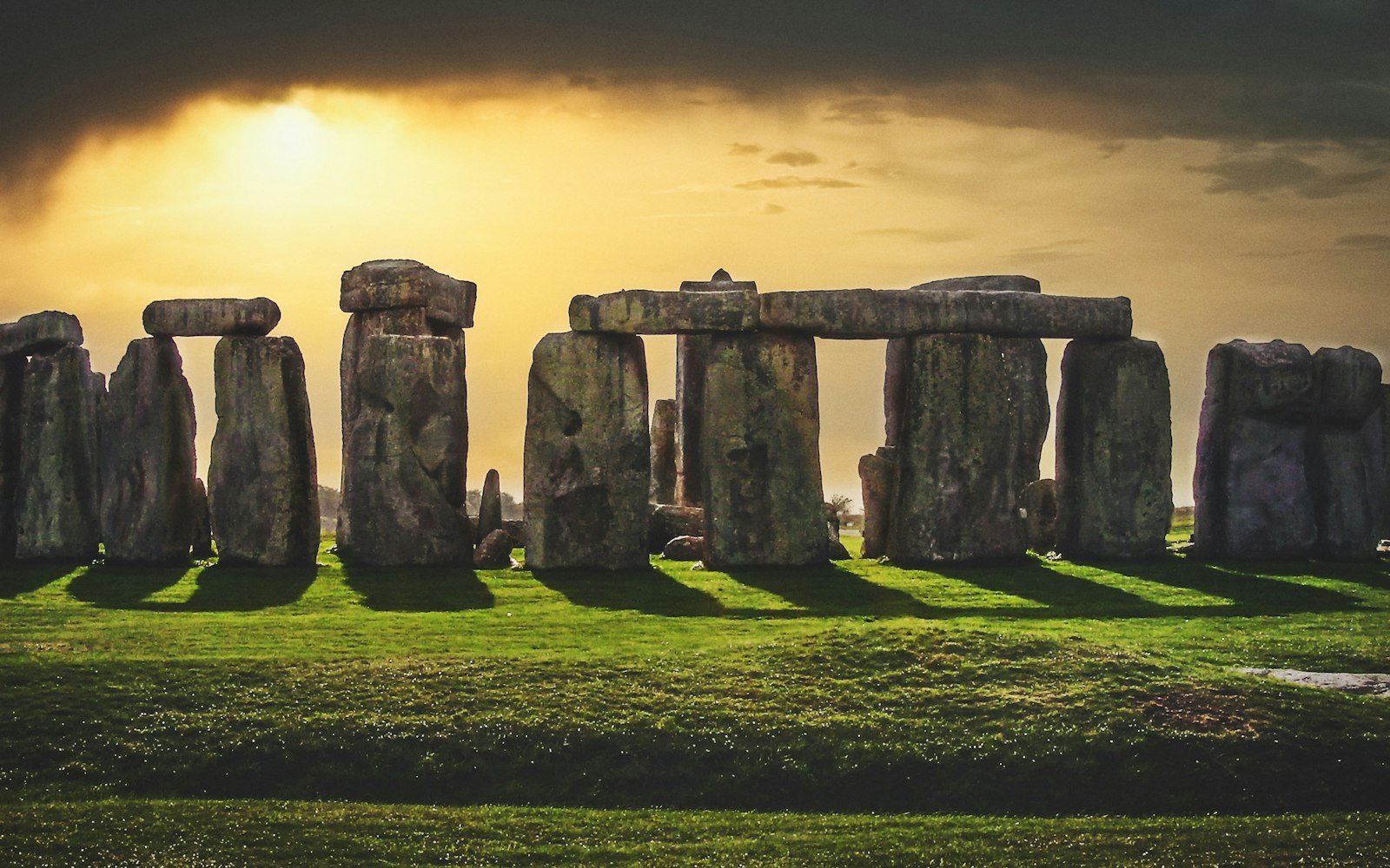 The trilithons of Stonehenge against a low sun